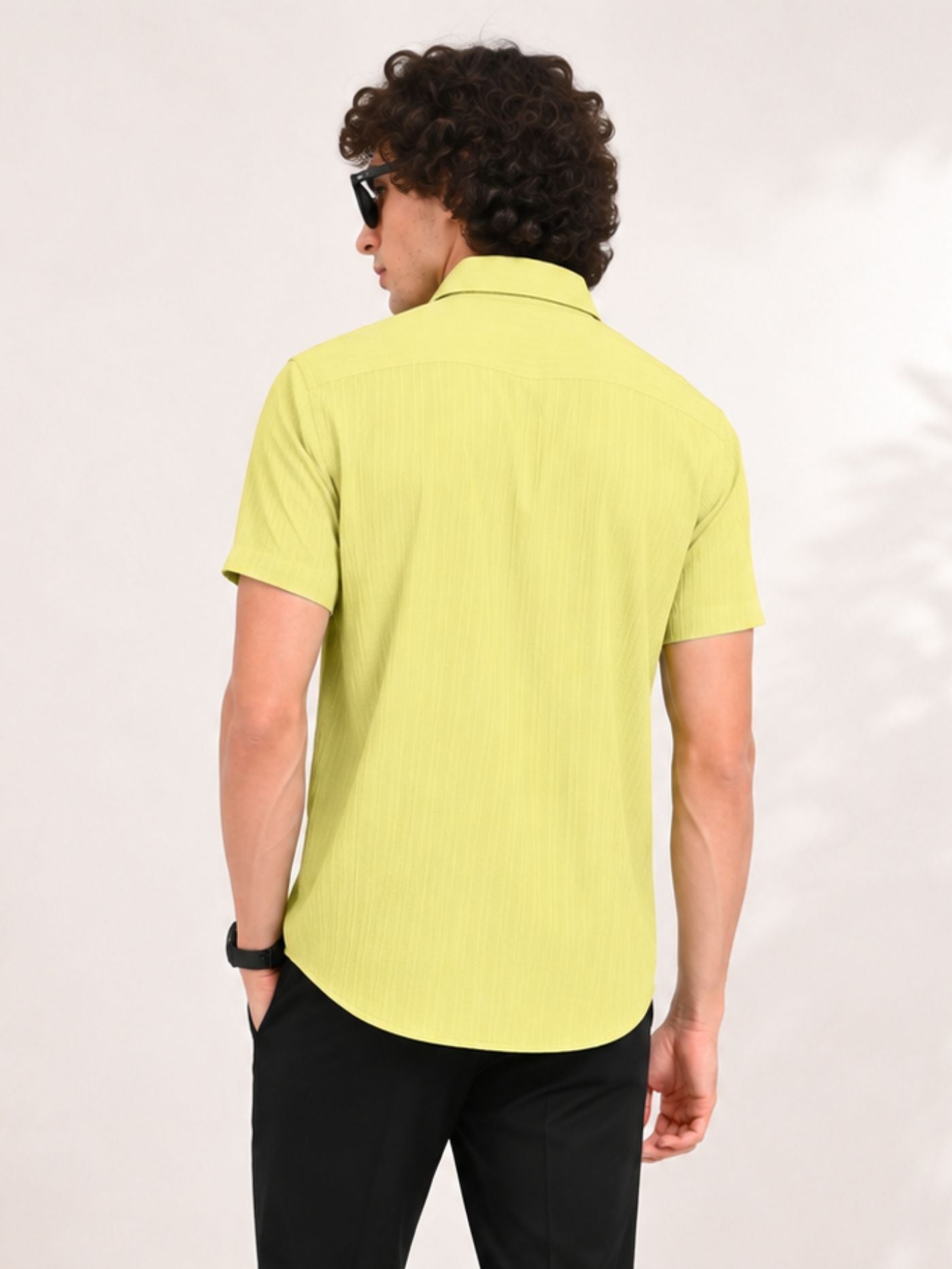 Back view of Cottonfolk Solace Lime Zest half-sleeve textured shirt