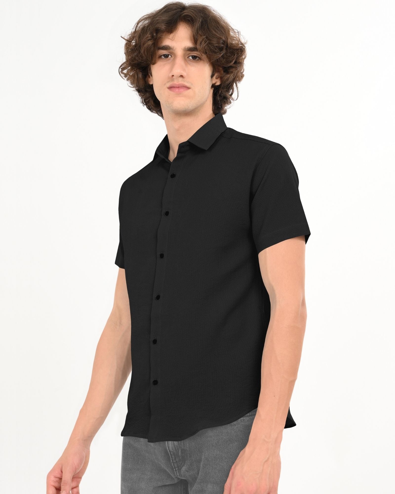 Black textured short-sleeve button-up shirt, front view