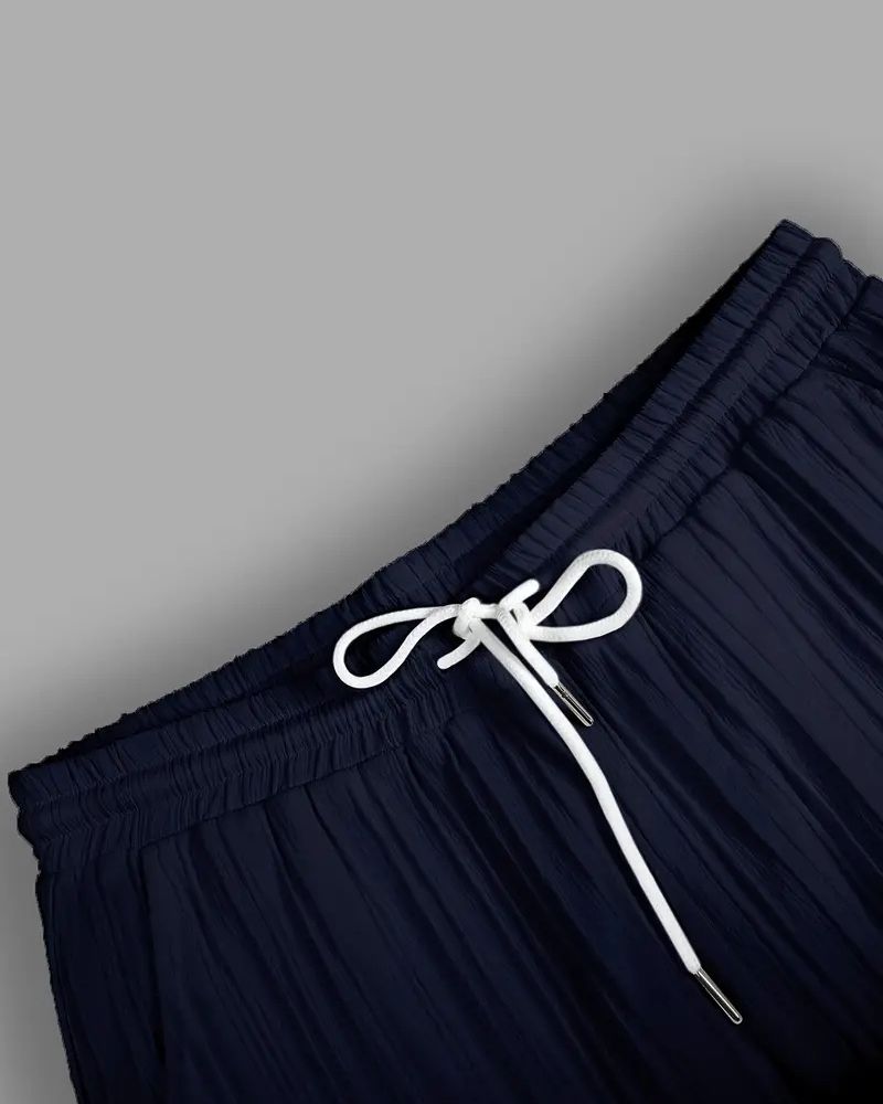Close-up detail of crinkle pleated waistband