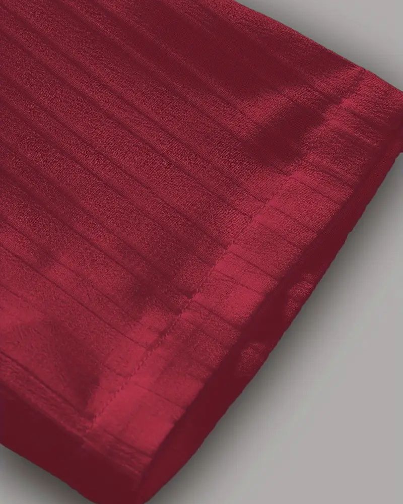 Close-up of crinkle texture and stitching on lounge pants