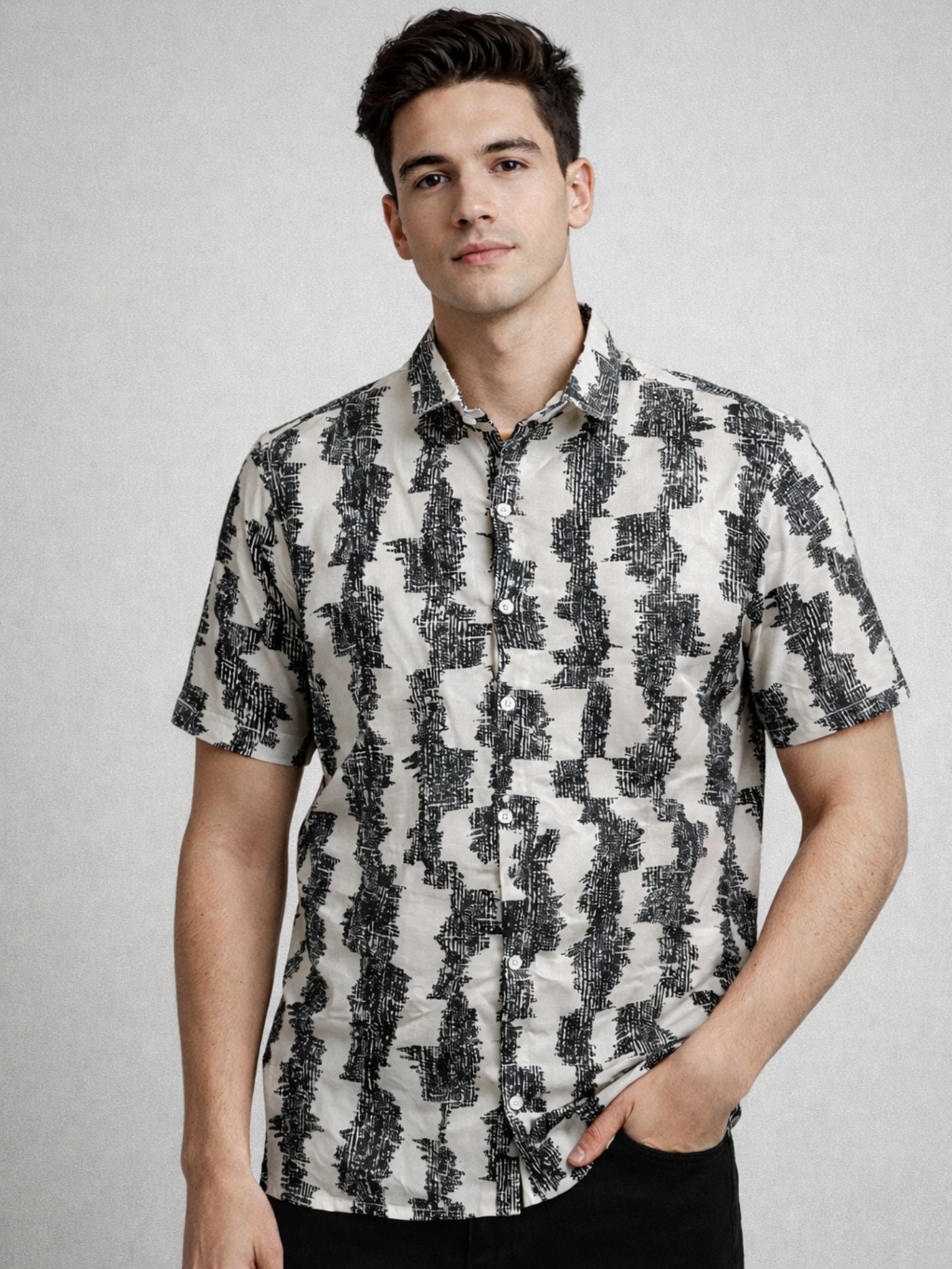 Man wearing Charcoal Canvas abstract black print shirt front view
