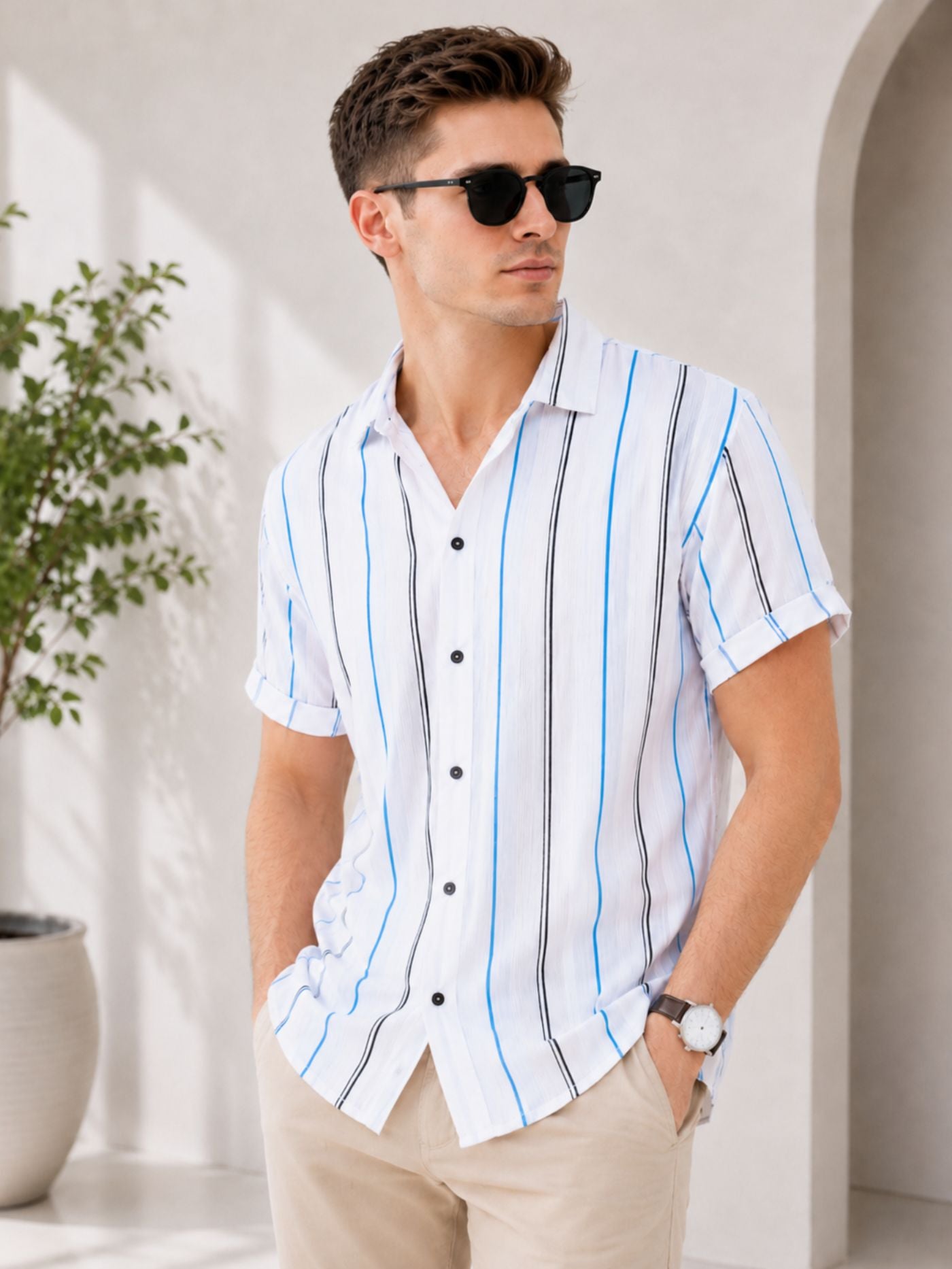 Men's white vertical stripe Cuban collar short sleeve casual shirt.