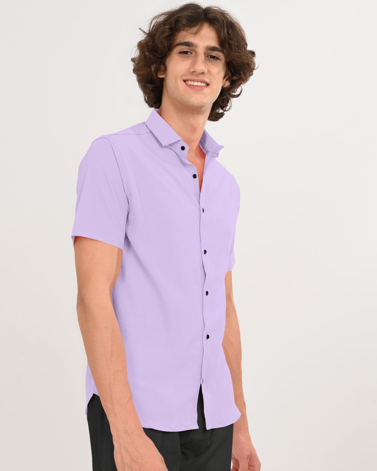 Side angle of men’s lilac textured short sleeve shirt
