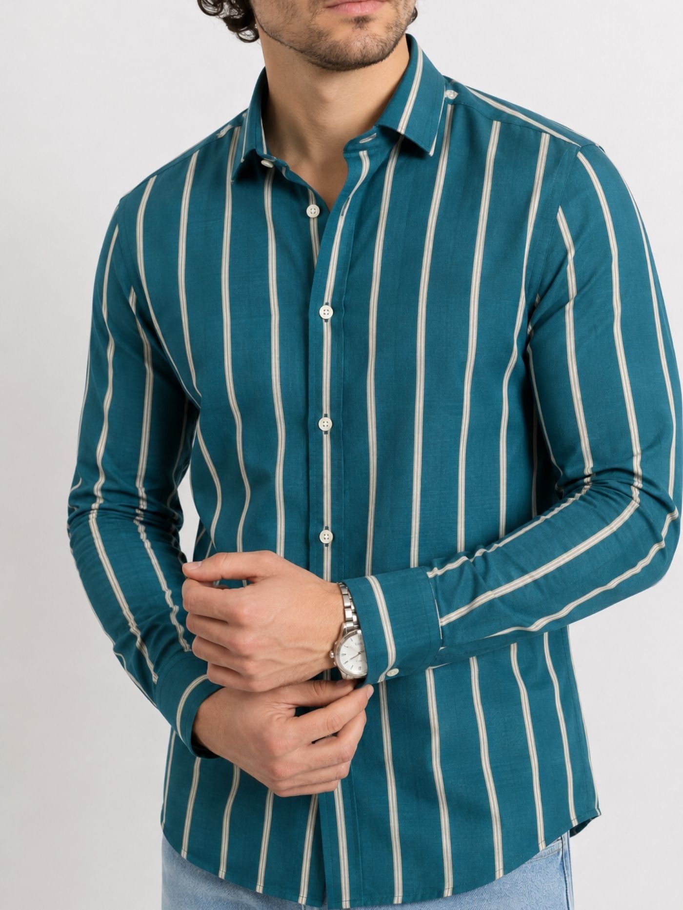 Close-up of Aeron deep teal striped shirt showing collar, buttons and fabric