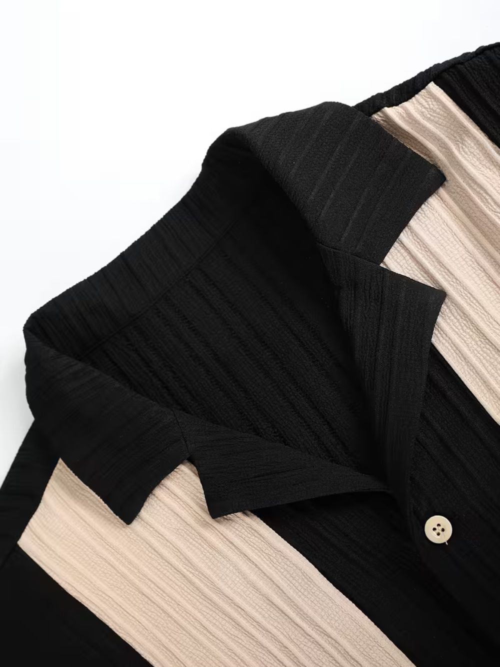 Collar and stitching detail of men’s streetwear shirt