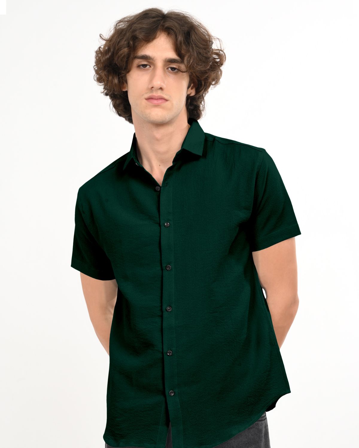 Front view of men’s dark green textured short sleeve shirt
