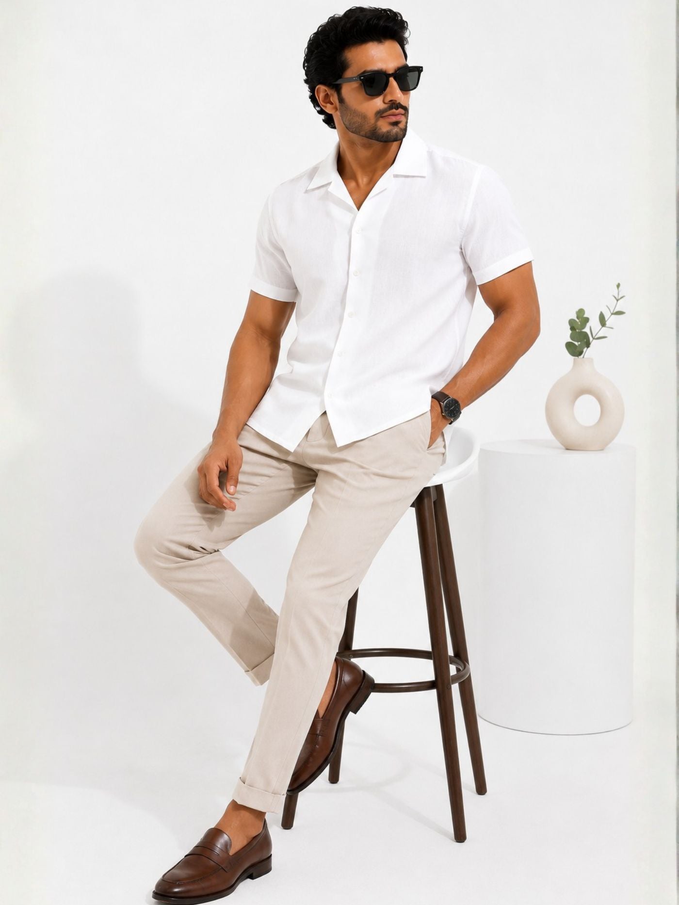 Full-length model wearing the Lucent Pure White Cuban Collar Shirt with beige trousers and brown loafers