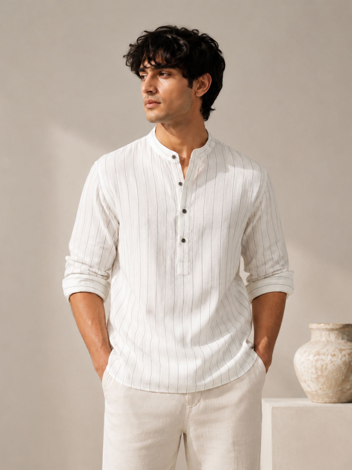 Men's white pinstripe Mandarin collar casual shirt with full sleeves.