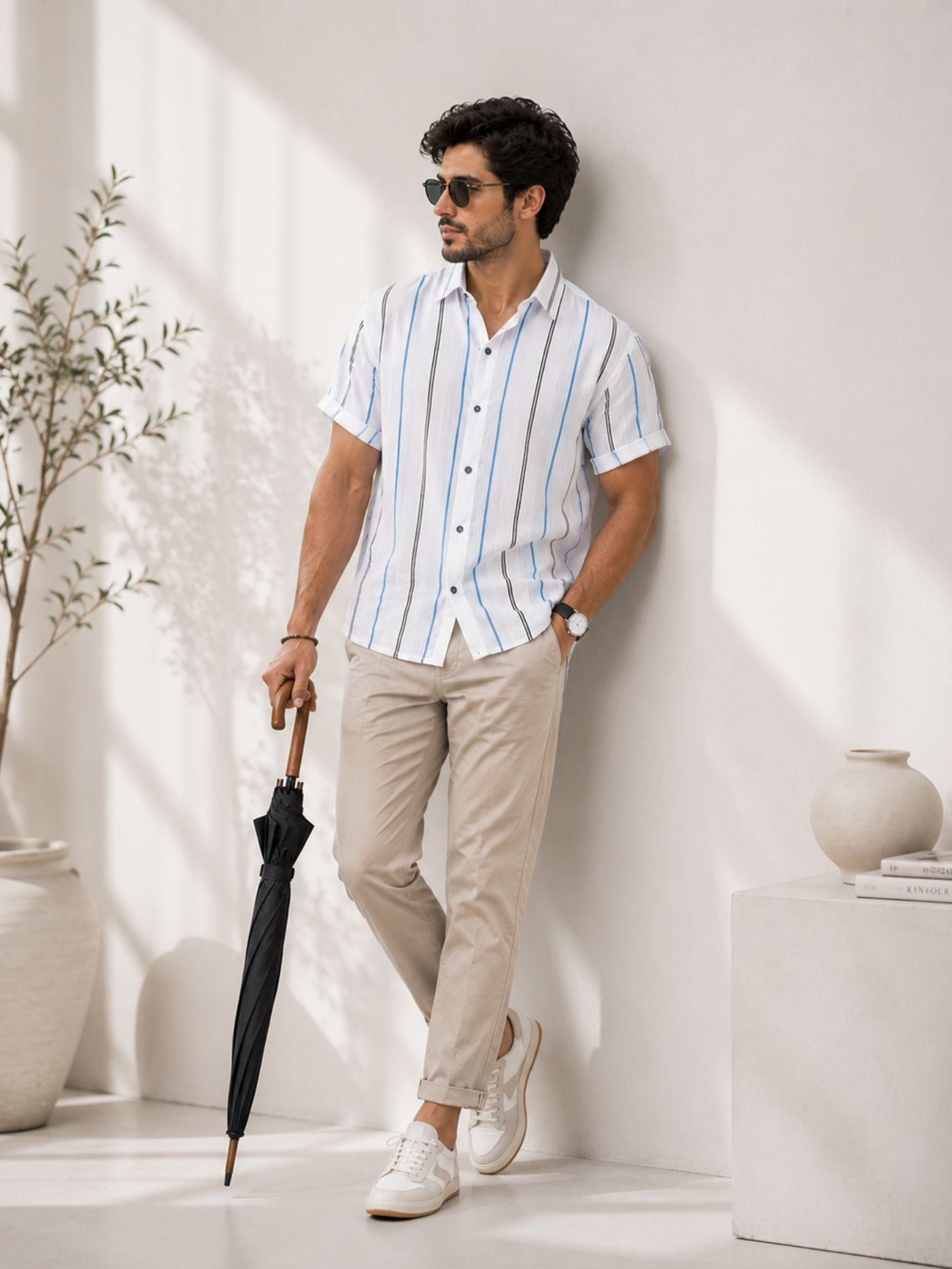 Premium men's white short sleeve shirt with blue and black vertical stripes.