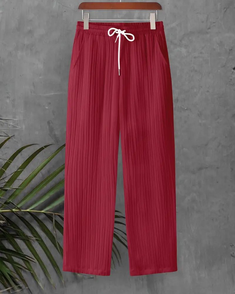 Men’s burgundy pleated pants made from sugarcane fabric