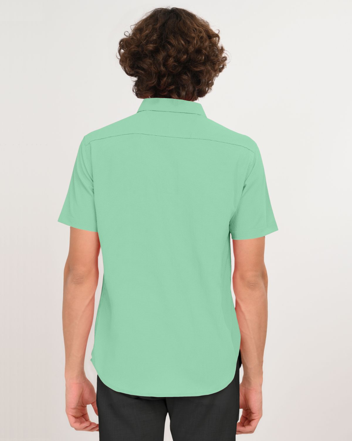 Mint green textured short sleeve shirt close-up front view