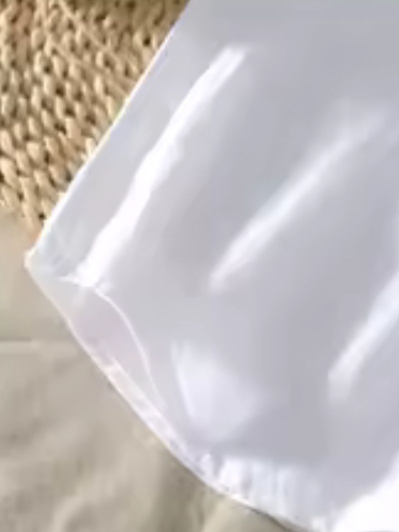 Premium traditionally stitched hem of khaki white Swiss linen shirt