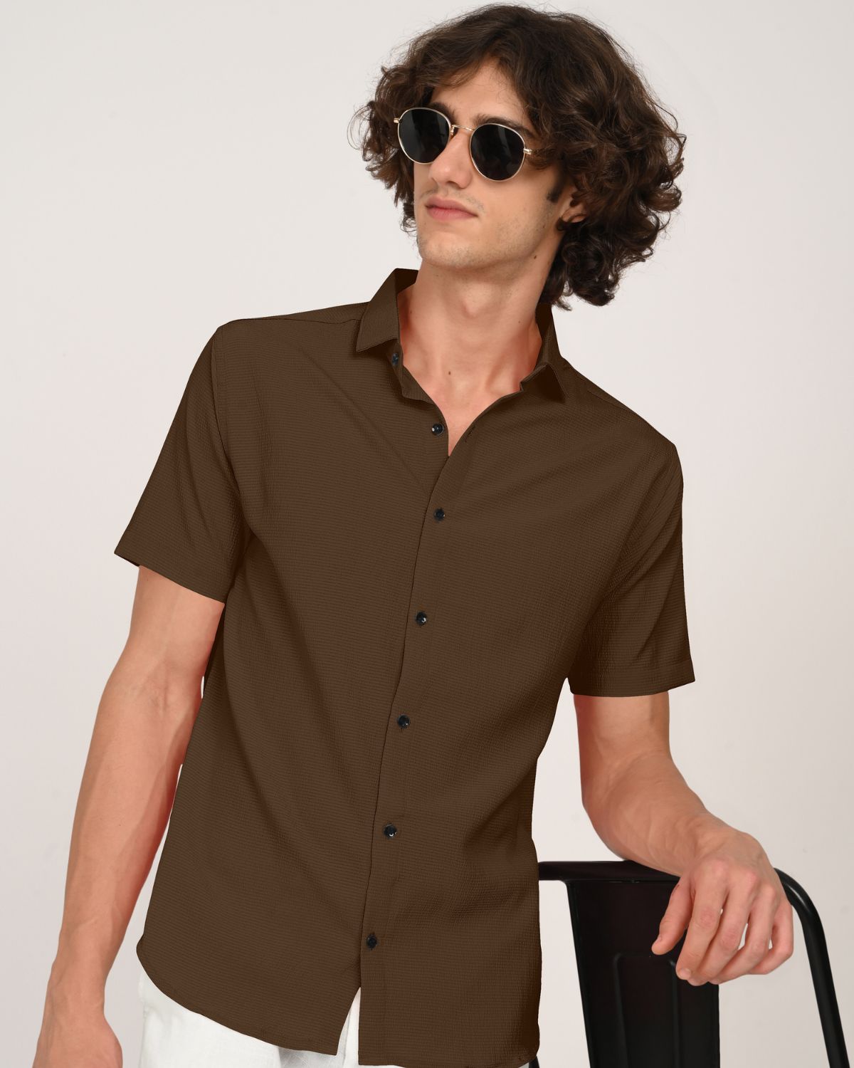 Side pose of men wearing espresso brown textured button-down shirt