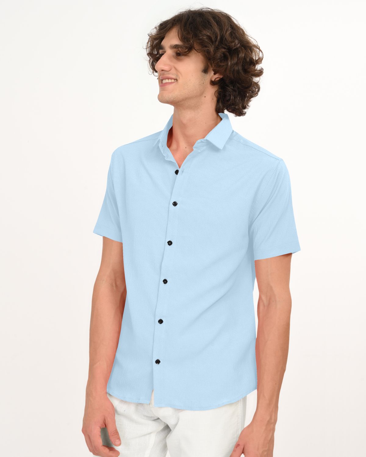 Side view of sky blue textured short sleeve shirt