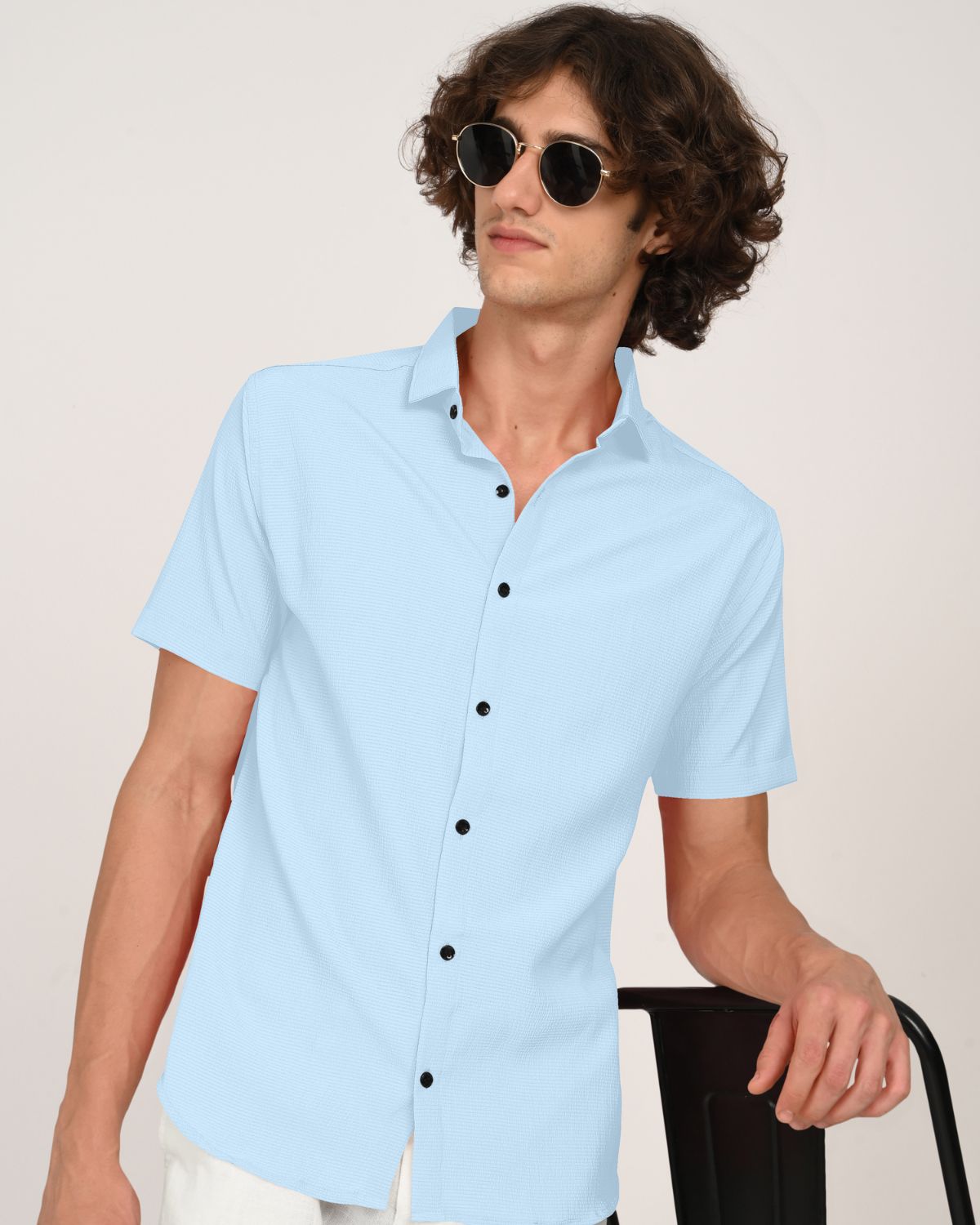 Sky blue crinkle short sleeve shirt with sunglasses pose