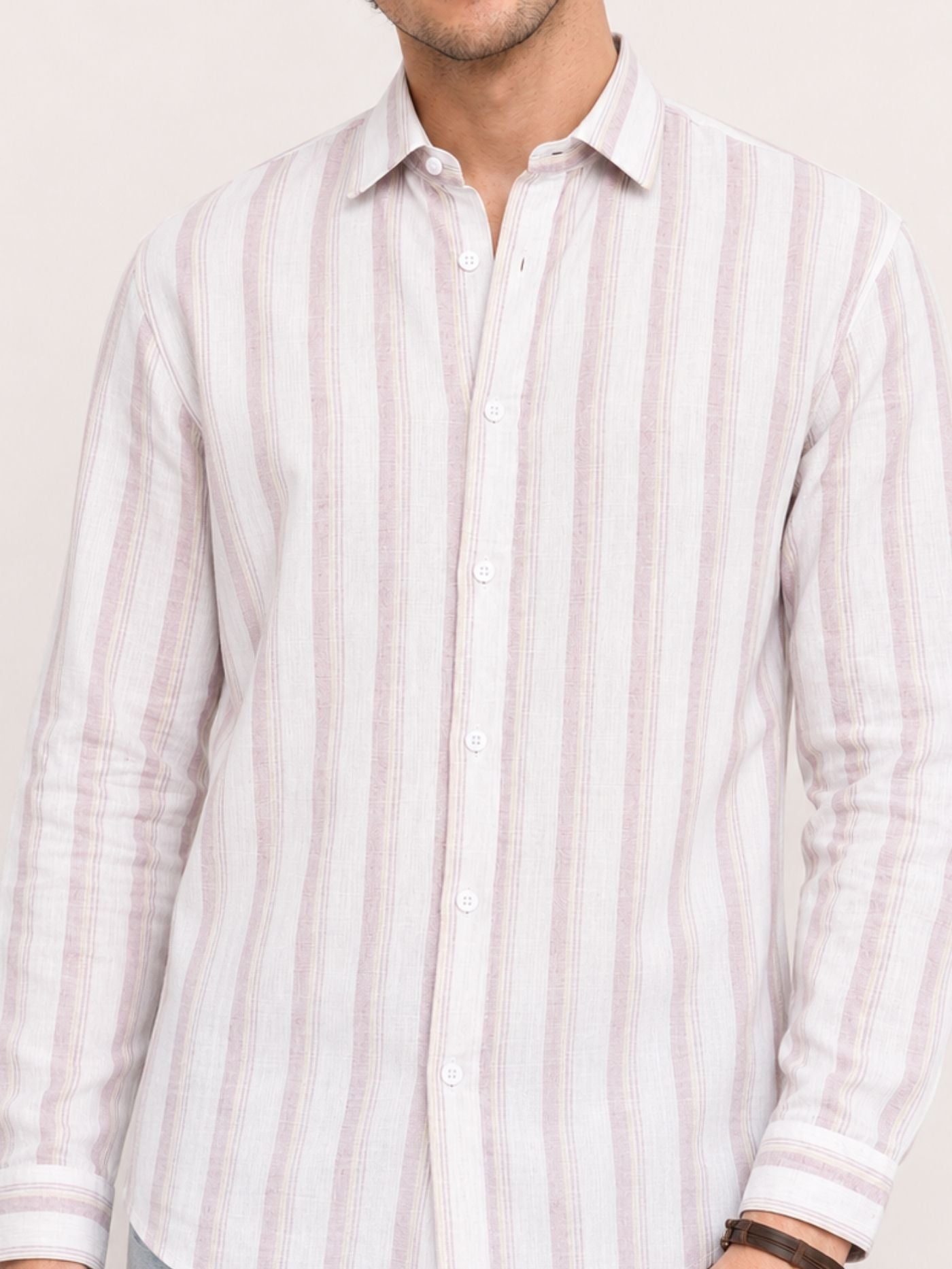 Close-up of men’s textured blush pink vertical stripe shirt