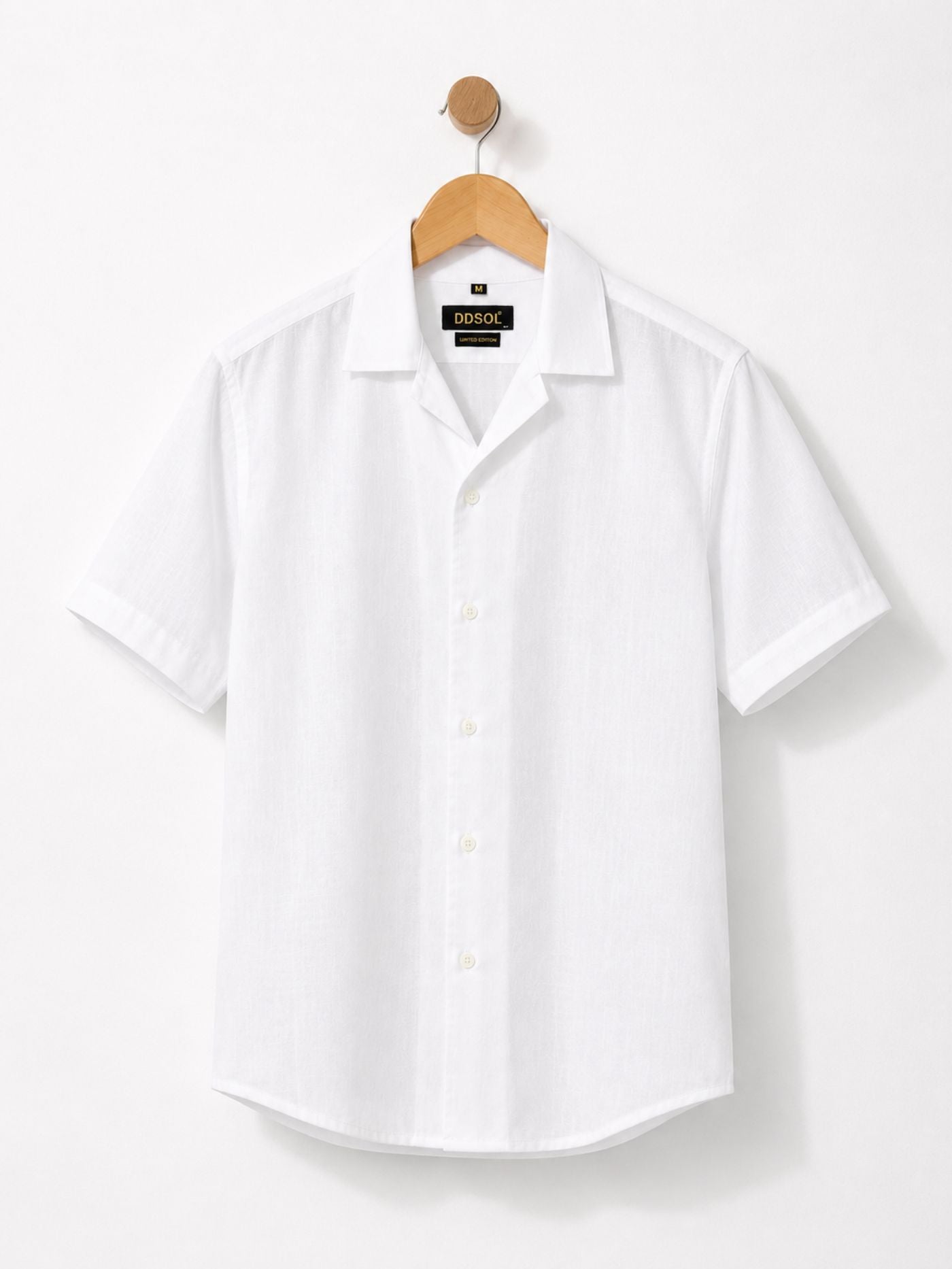 The Lucent Cuban Collar Shirt Pure White back view on wooden hanger