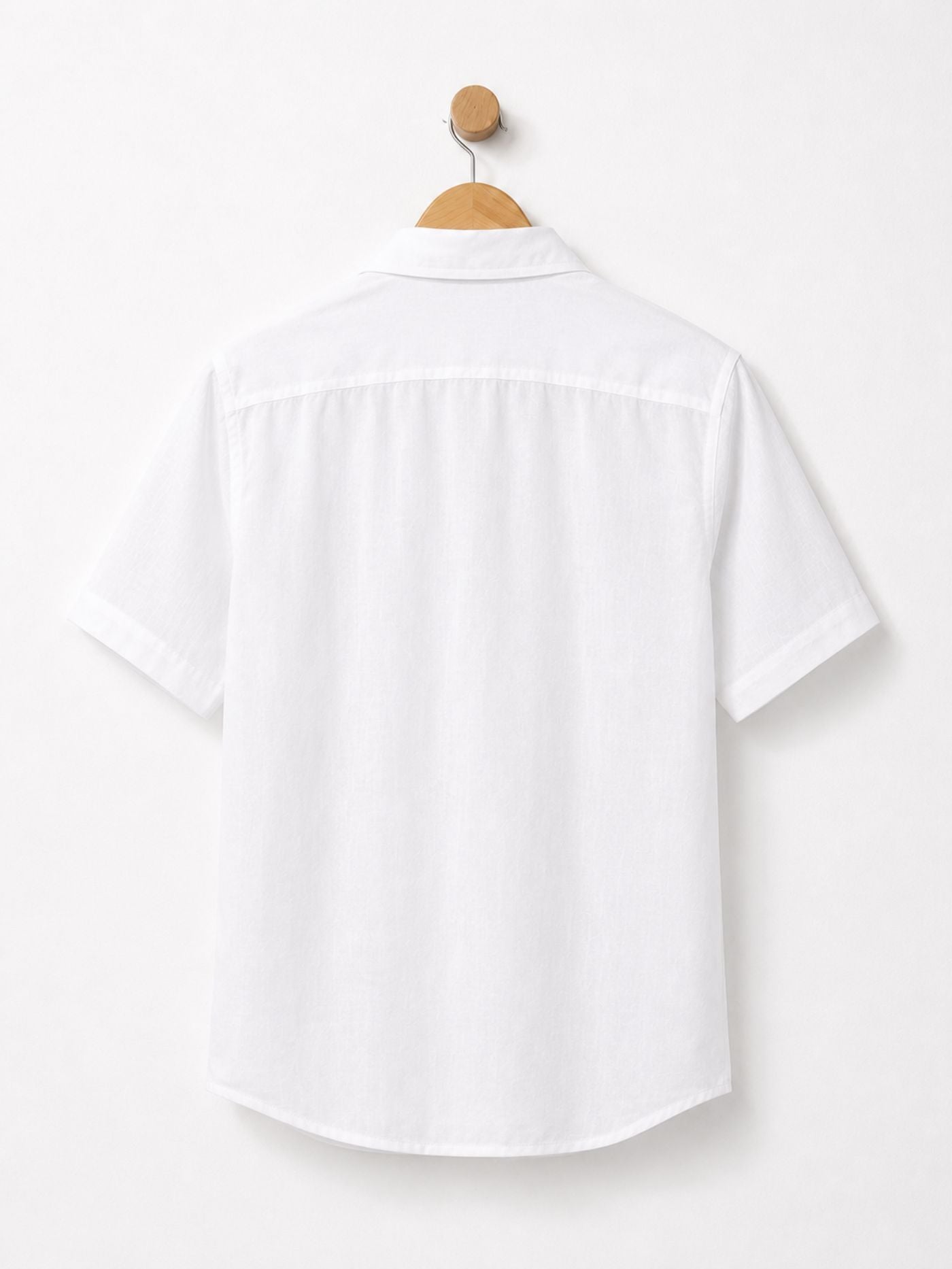 The Lucent Cuban Collar Shirt Pure White front view on wooden hanger