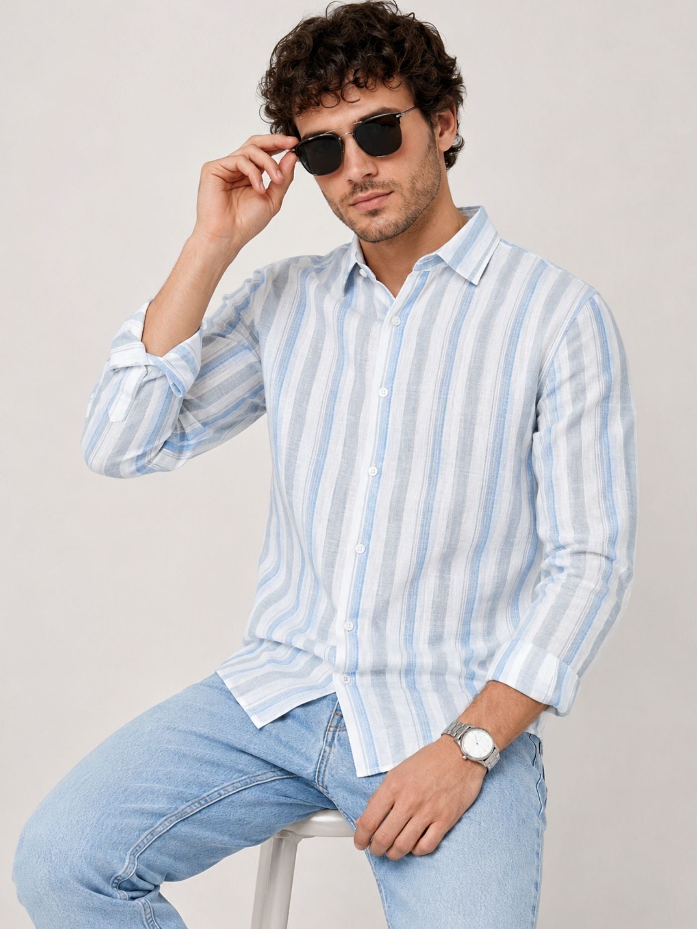 Close-up of Caelum sky blue cotton-rich striped shirt showing collar, buttons and cuffs